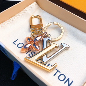 lv louis vuitton new wave bag charm and key holder