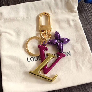 lv louis vuitton new wave bag charm and key holder #m63749