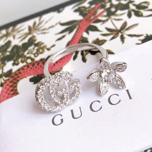 gucci flower and double g ring with diamonds