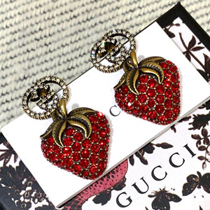 gucci earrings with strawberry pendant