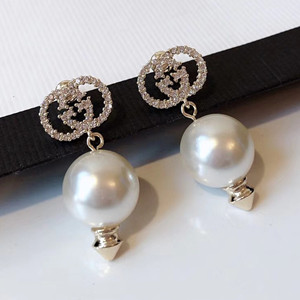 gucci interlocking g earrings with pearl
