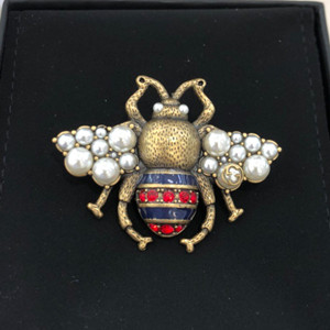 gucci bee brooch with crystals and pearls