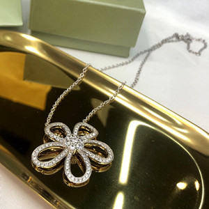 van cleef & arpels flowerlace pendant necklace