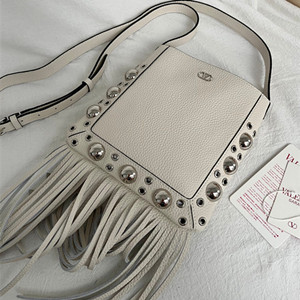 valentino garavani nellcôte small shoulder bag with fringes