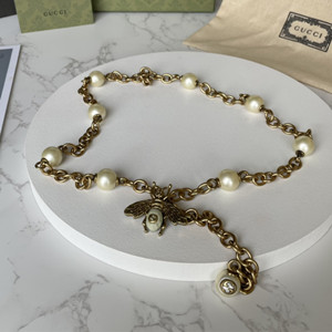 gucci chain belt with charm